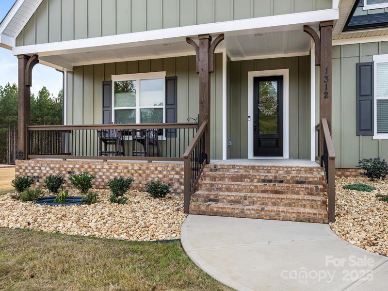 Front, covered porch & eave lighting