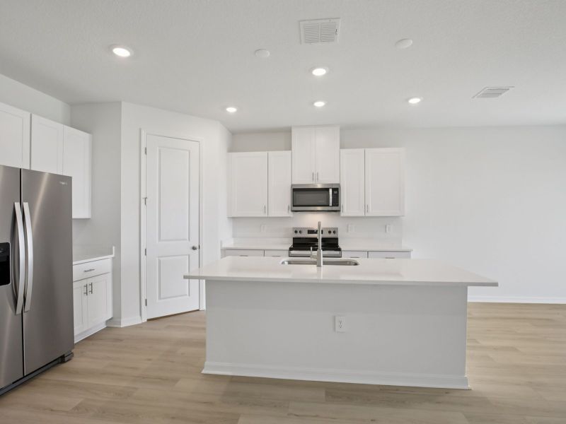 Furnished interior view inside a new home in Coasterra - Reserve Series, Palmetto (Image 5).