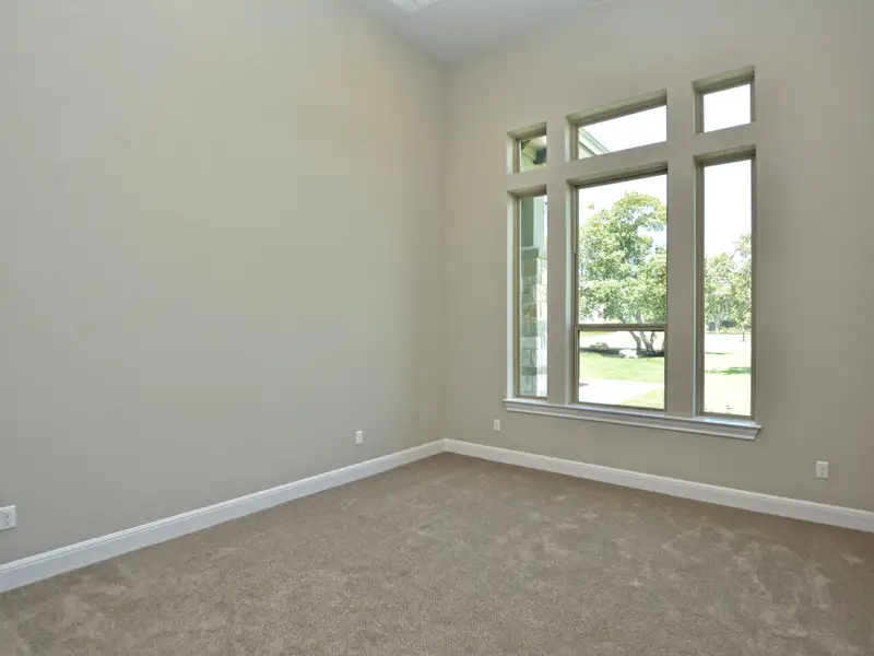 Representative unfurnished interior of a home built from the Santa Barbara II by Giddens Homes in Scofield Farms Estates, Georgetown (Image 104).