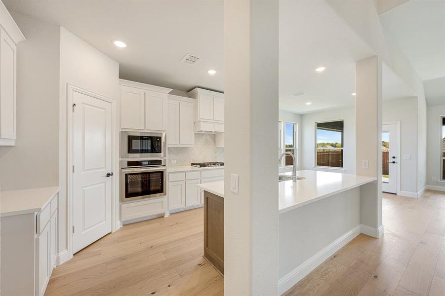 Furnished interior view inside a new home in Hunters Ridge, Crowley (Image 12).