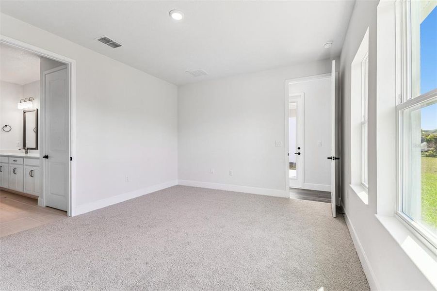 Spacious, unfurnished interior of a new home in Waterset Tradition Series, Apollo Beach (Image 20).