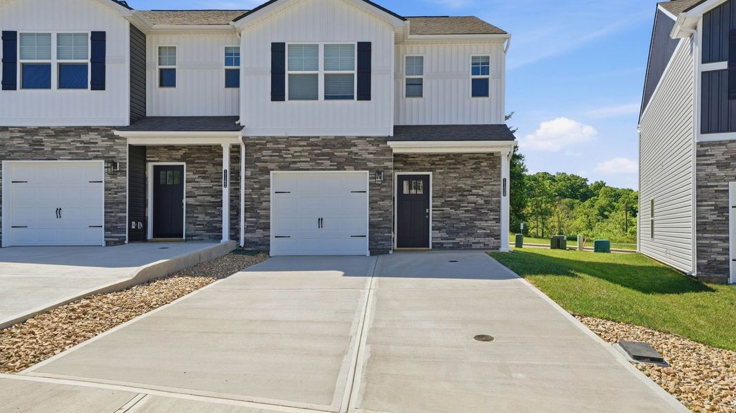 Front exterior of a new home in The Arbor Townhomes, Kingsport, TN, highlighting curb appeal (Image 2).