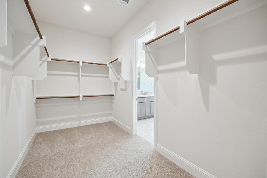 One of two walk-in Primary Closets. One of two walk-in Primary Closets.