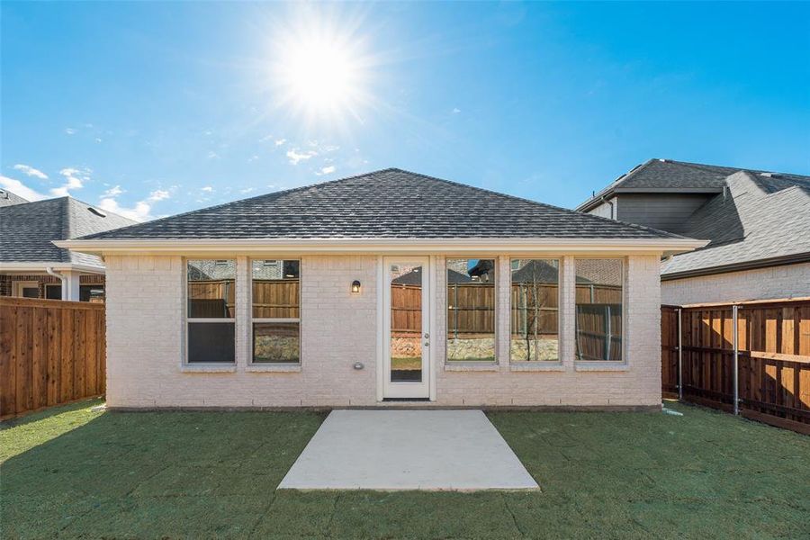 Exterior details and patio area of a home in Spiritas Ranch, Little Elm (Image 19).