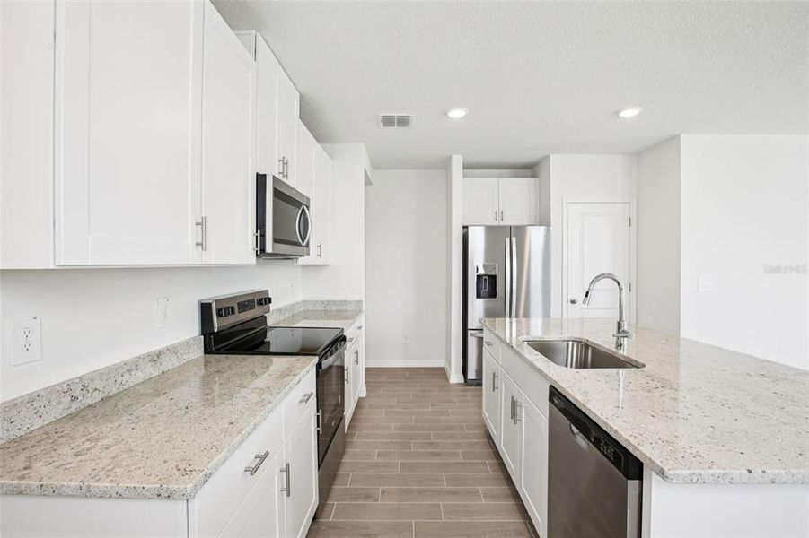 Furnished interior view inside a new home in Two Rivers - Premier Series, Zephyrhills (Image 3).