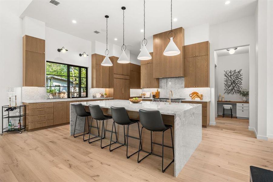 Luxury and function meet in this showstopping kitchen, perfect for gatherings large or small.