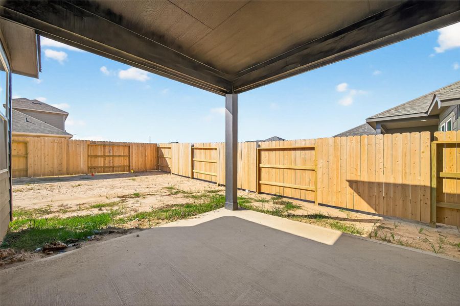 Exterior details and patio area of a home in Sunterra, Katy (Image 19). Exterior details and patio area of a home in Sunterra, Katy (Image 19).