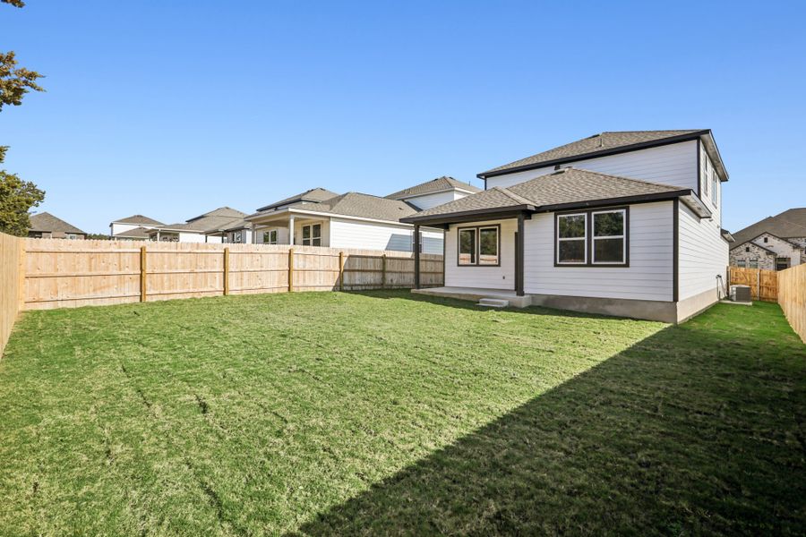A house with a fence around it.
