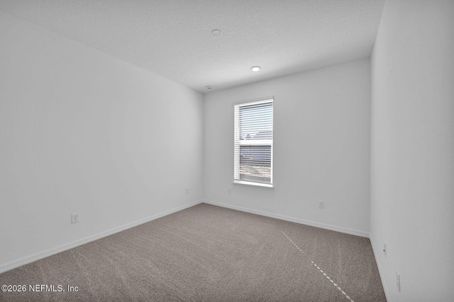 Spacious, unfurnished interior of a new home in Del Webb Wildlight, Yulee (Image 19).