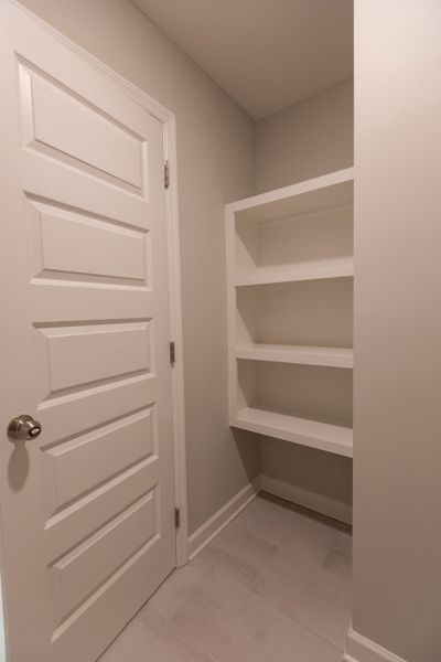 Representative furnished interior of a home built from the Dalton by Parkside Builders in The Woods, Gallatin (Image 11).