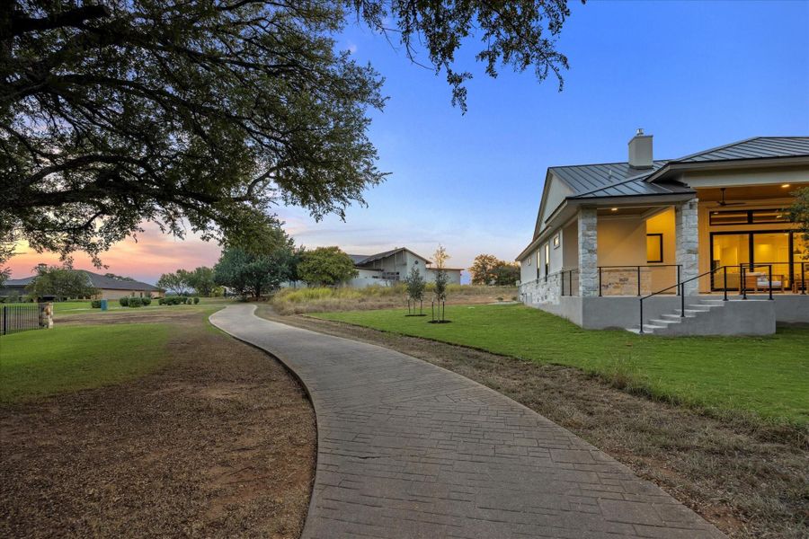 Front exterior of a new home in , Horseshoe Bay, TX, highlighting curb appeal (Image 20). Front exterior of a new home in , Horseshoe Bay, TX, highlighting curb appeal (Image 20).