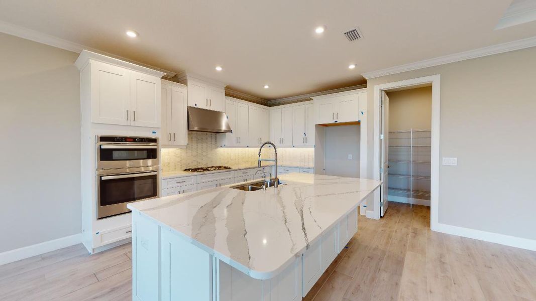 Representative furnished interior of a home built from the Azzurro by Taylor Morrison in Esplanade by the Islands, Naples (Image 7).