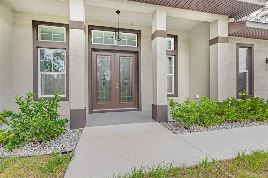 Front exterior of a new home in , Palm Coast, FL, highlighting curb appeal (Image 25).
