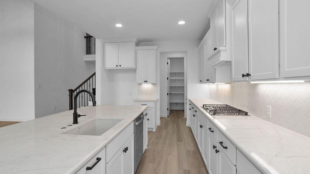 Furnished interior view inside a new home in Candela South 60', Richmond (Image 6).