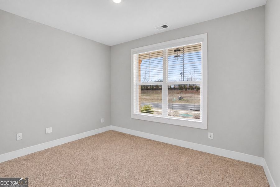 Spacious, unfurnished interior of a new home in The Fairways at Mirror Lake, Villa Rica (Image 24). Spacious, unfurnished interior of a new home in The Fairways at Mirror Lake, Villa Rica (Image 24).