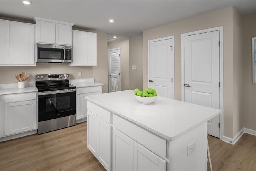 Furnished interior view inside a new home in Highland Park Condos, White House (Image 3). Furnished interior view inside a new home in Highland Park Condos, White House (Image 3).