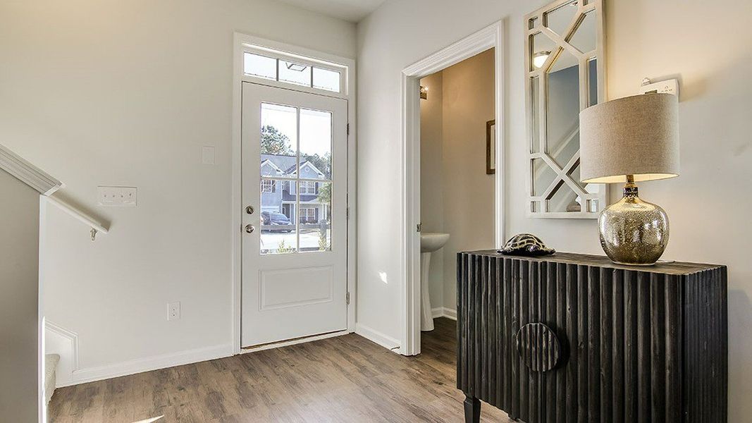 Representative furnished interior of a home built from the Aisle by D.R. Horton in Cobblestone Village, Savannah (Image 11).