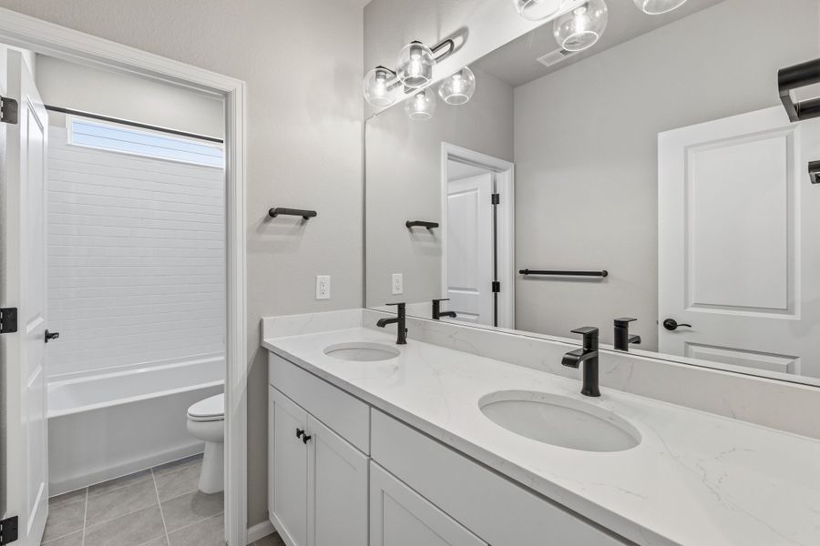 Furnished interior view inside a new home in The Estates Collection at Murphy Creek, Aurora (Image 11).