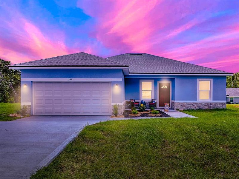 Front exterior of a new home in , Ocala, FL, highlighting curb appeal (Image 15).