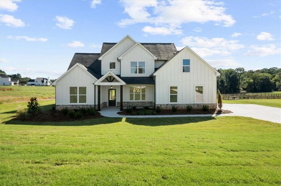 Front exterior of a new home in , Cumming, GA, highlighting curb appeal (Image 32).