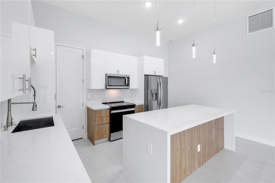 Furnished interior view inside a new home in , Port Charlotte (Image 6). Furnished interior view inside a new home in , Port Charlotte (Image 6).