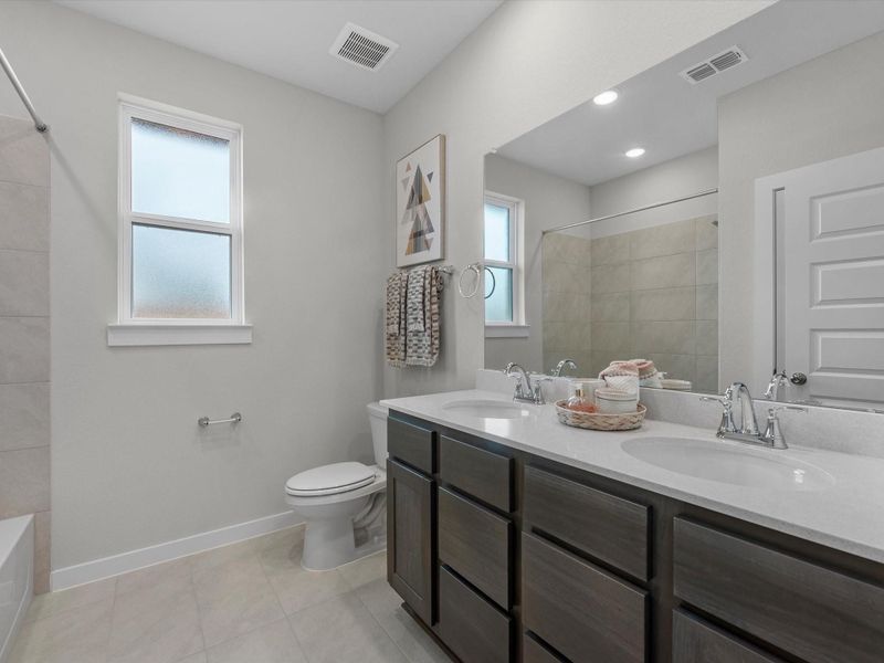 Furnished interior view inside a new home in Mason Woods, Cypress (Image 14).
