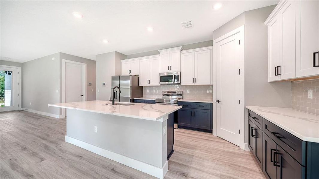 Furnished interior view inside a new home in , North Port (Image 29).
