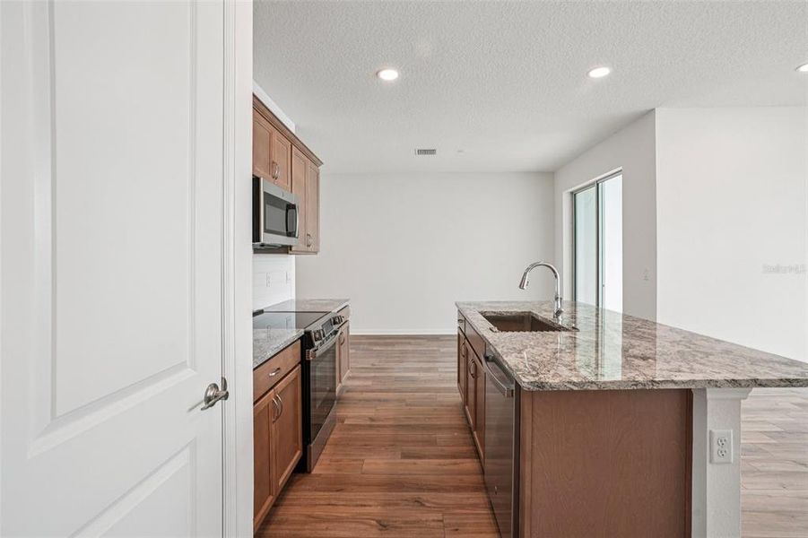 Furnished interior view inside a new home in Isla Mirada, San Antonio (Image 5).
