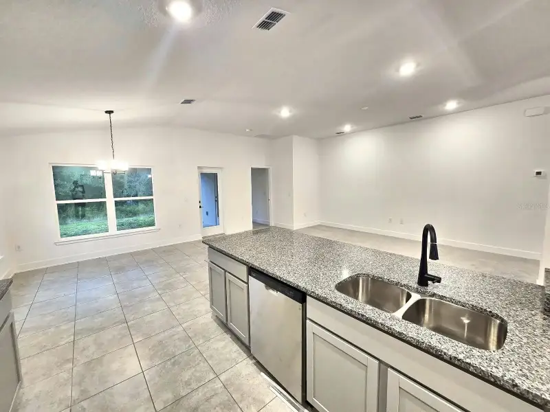 Furnished interior view inside a new home in Harmony Central, Harmony (Image 5).