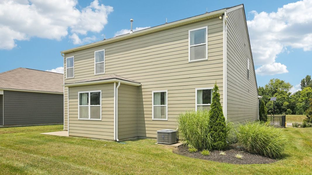 Exterior details and patio area of a home in Woodbridge Glen Single Family, Lebanon (Image 23).