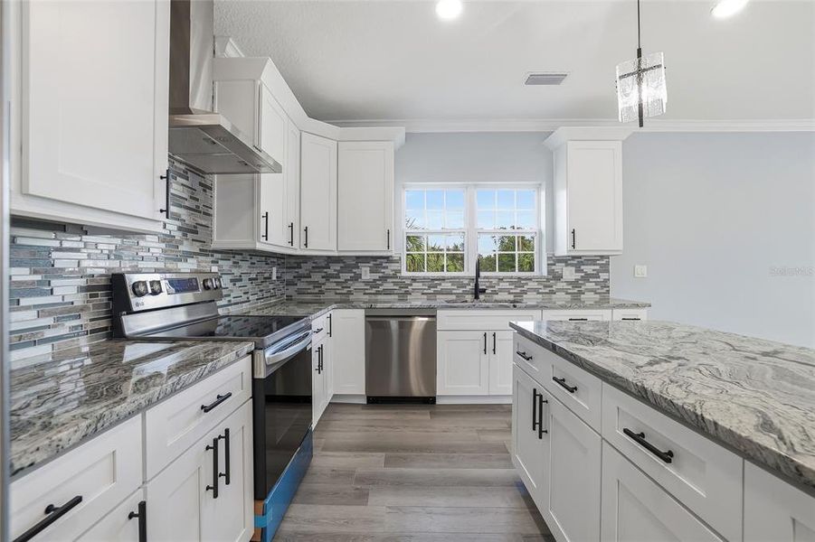 Furnished interior view inside a new home in , Tarpon Springs (Image 6).
