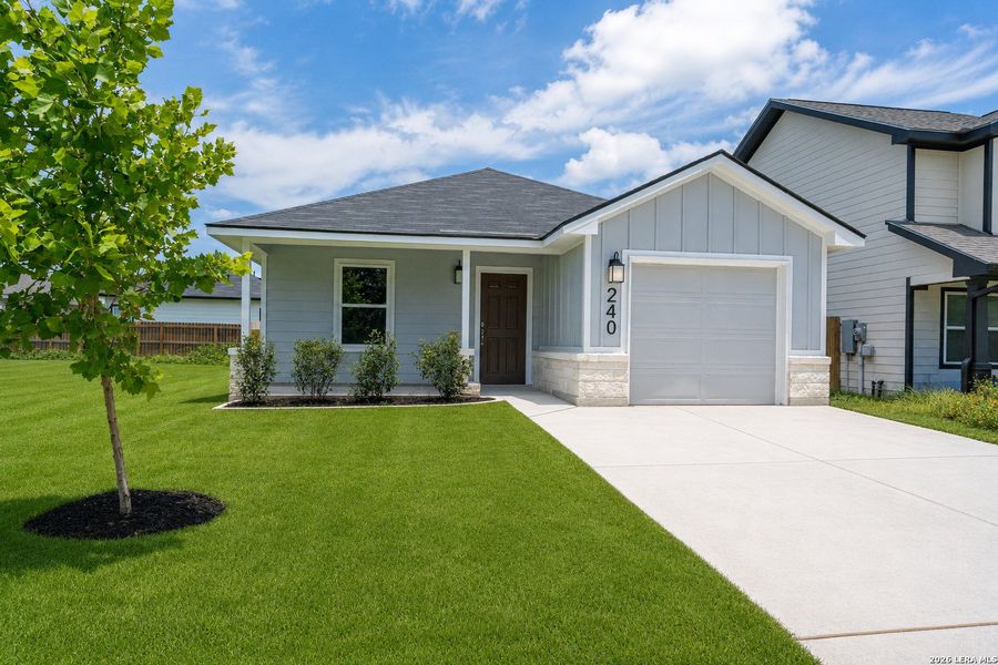 Front exterior of a new home in , Seguin, TX, highlighting curb appeal (Image 16).