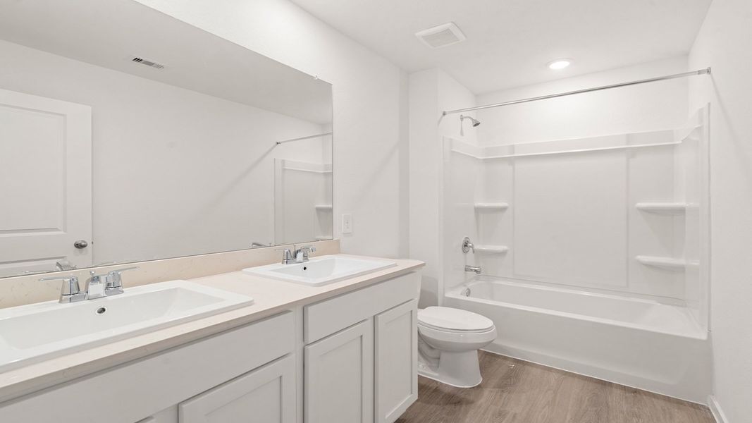 Furnished interior view inside a new home in Sunterra Lakes, Brookshire (Image 8).