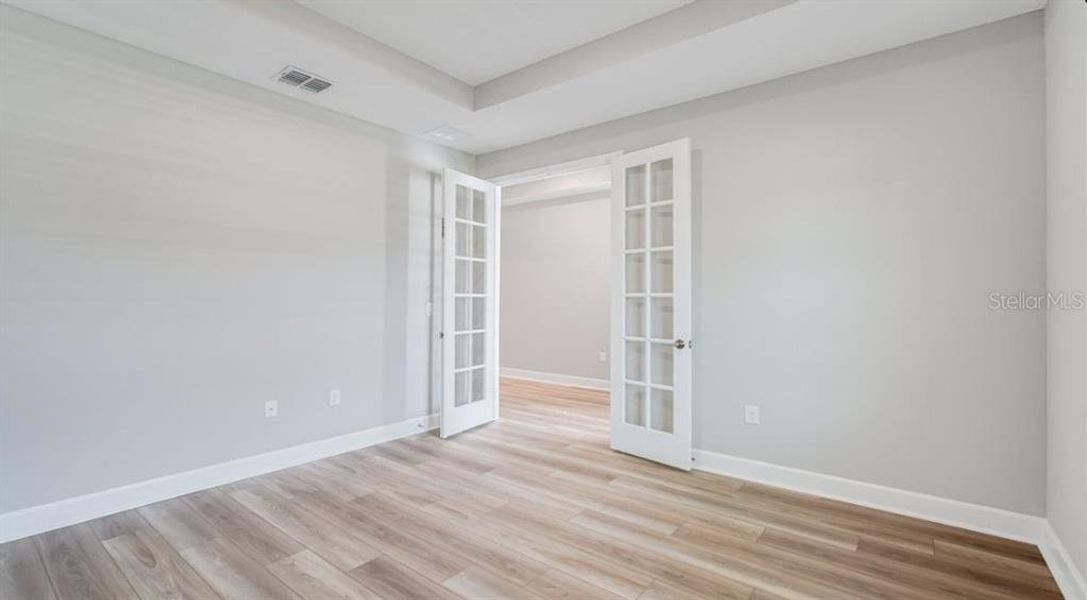 Spacious, unfurnished interior of a new home in The Cove at West Port, Port Charlotte (Image 22).