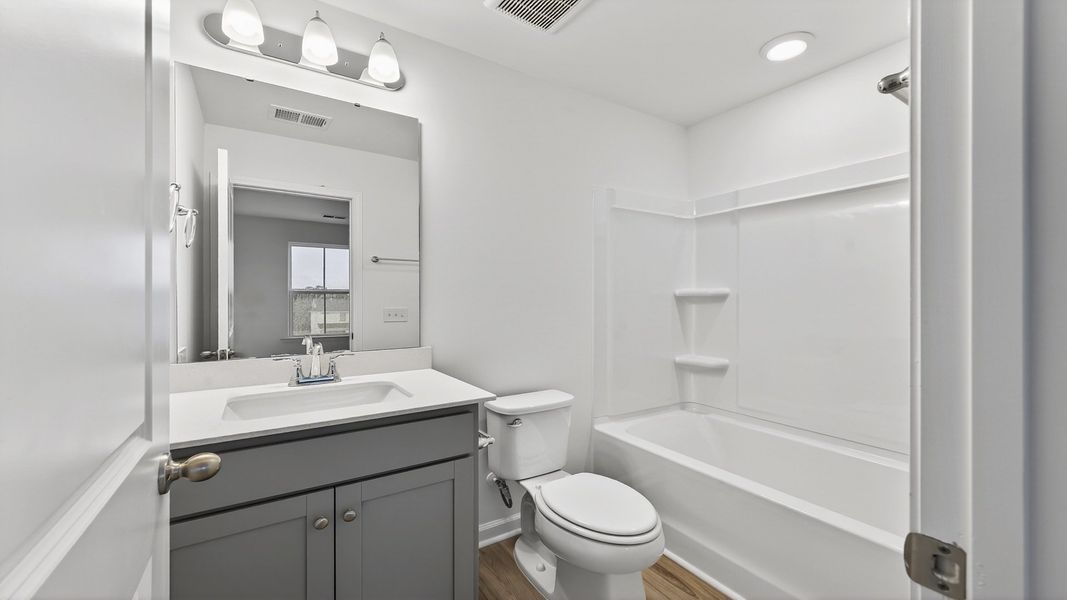 Furnished interior view inside a new home in Clear Springs Townhomes, North Charleston (Image 15).
