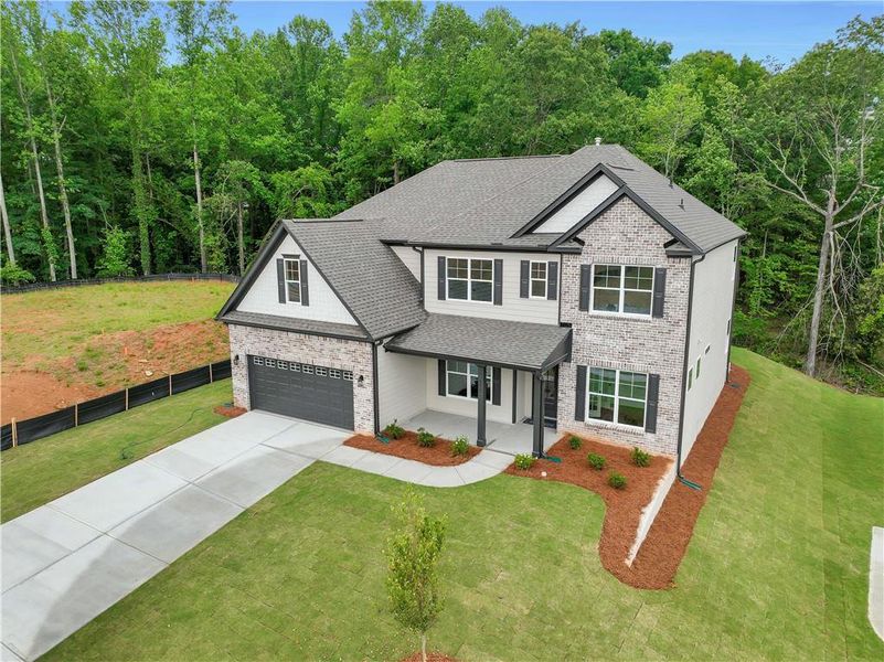 Front exterior of a new home in Arbor West, Dawsonville, GA, highlighting curb appeal (Image 28).