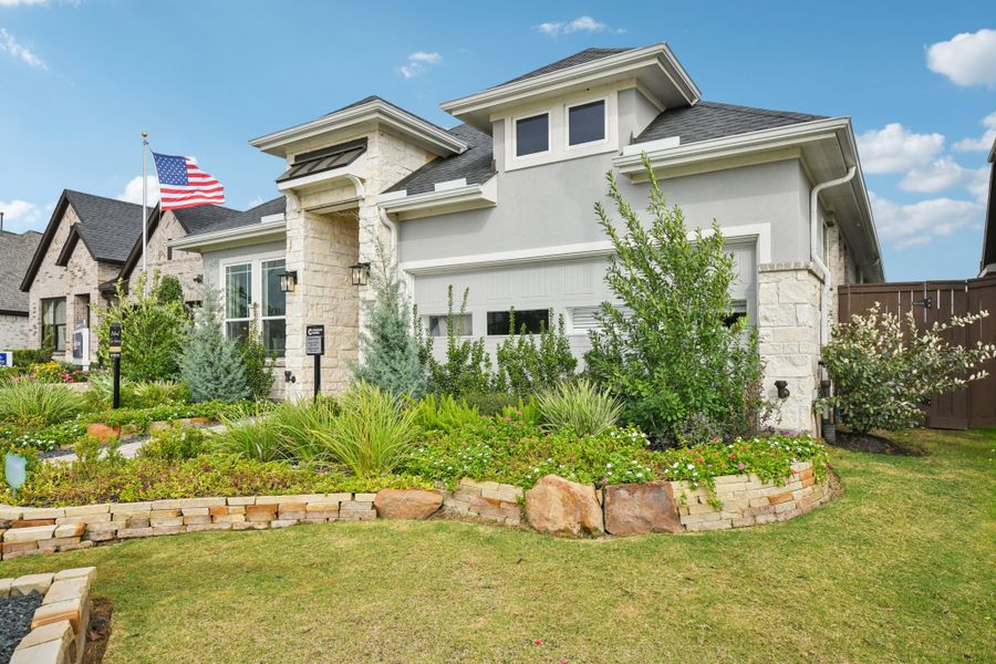 Front exterior of a new home in Wood Leaf Reserve, Tomball, TX, highlighting curb appeal (Image 25).