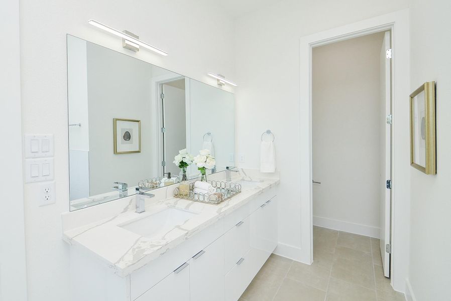 Primary Bathroom (Sample photo from similar floor plan built by the builder)