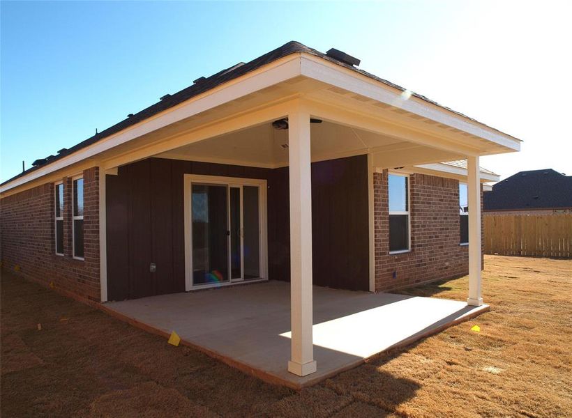 Back of property with a patio area