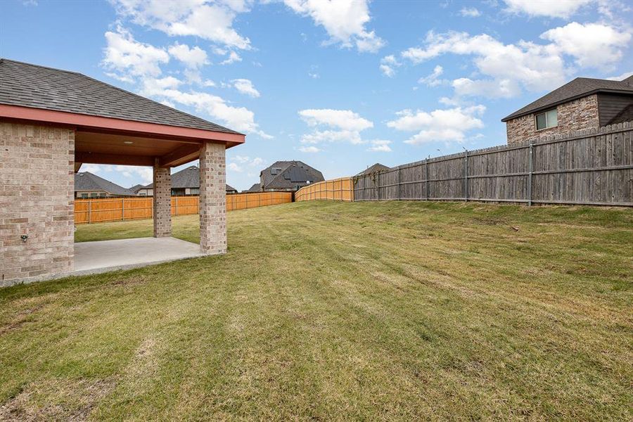 View of yard with a patio area