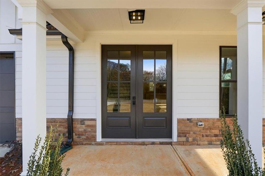 Exterior details and patio area of a home in , Statham (Image 4).