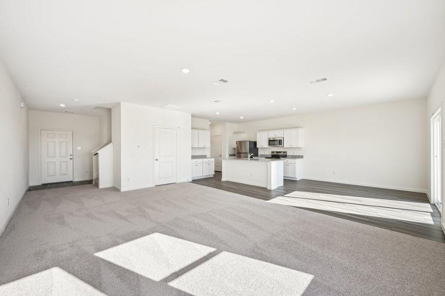 Representative unfurnished interior of a home built from the Discovery by Starlight Homes in Royal Pines, Porter (Image 16).
