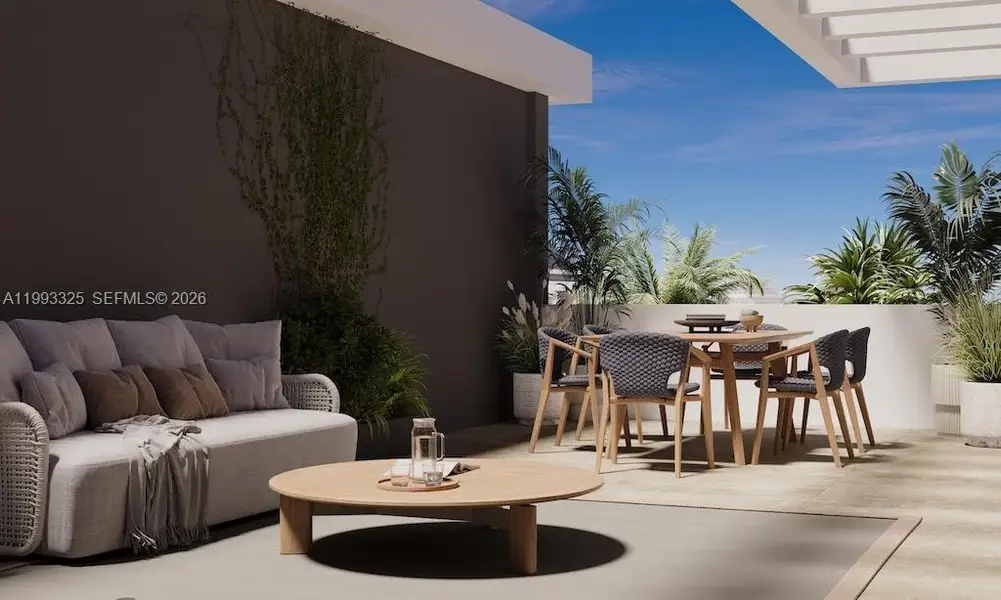 Exterior details and patio area of a home in , Miami Beach (Image 1). Exterior details and patio area of a home in , Miami Beach (Image 1).