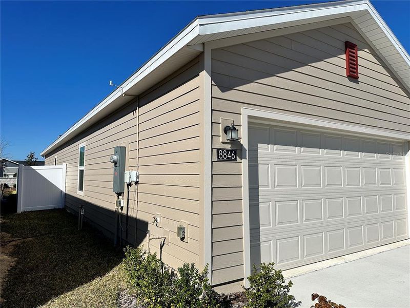 Exterior details and patio area of a home in Pioneer Ranch, Ocala (Image 35).