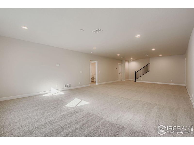 Spacious, unfurnished interior of a new home in RainDance National 60/70, Windsor (Image 15).