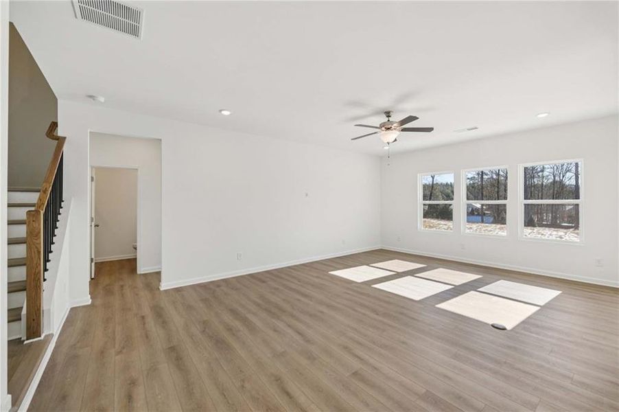 Spacious, unfurnished interior of a new home in Eastlyn Crossing, Flowery Branch (Image 14).