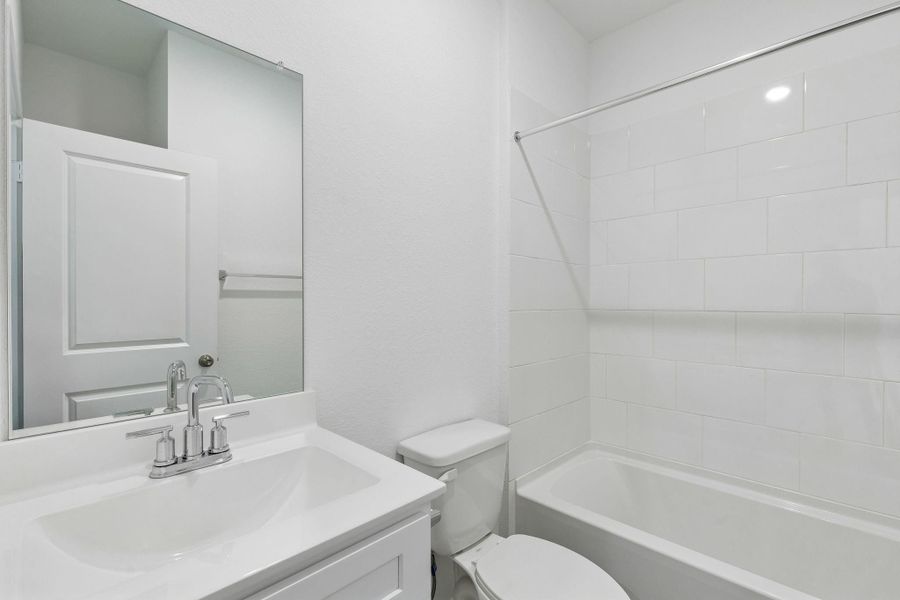 Furnished interior view inside a new home in Mavera, Conroe (Image 12).