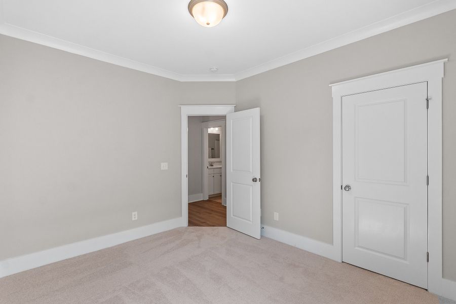 Representative unfurnished interior of a home built from the Grantville by Bill Clark Homes in The Sanctuary at Sunset Beach, Sunset Beach (Image 26).
