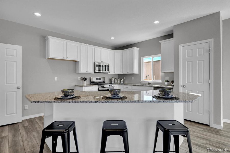 Quartz counters, stainless steel appliances, pantry included Quartz counters, stainless steel appliances, pantry included