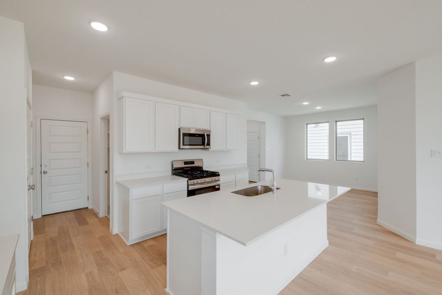 Furnished interior view inside a new home in Trinity Ranch, Elgin (Image 8).